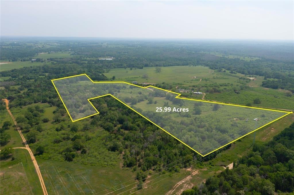 View 1 Synergy Dr in Knight, Jas & Wcwhite 1 Synergy Dr - front exterior - Luxury lot in Knight, Jas & Wcwhite, Bastrop, TX