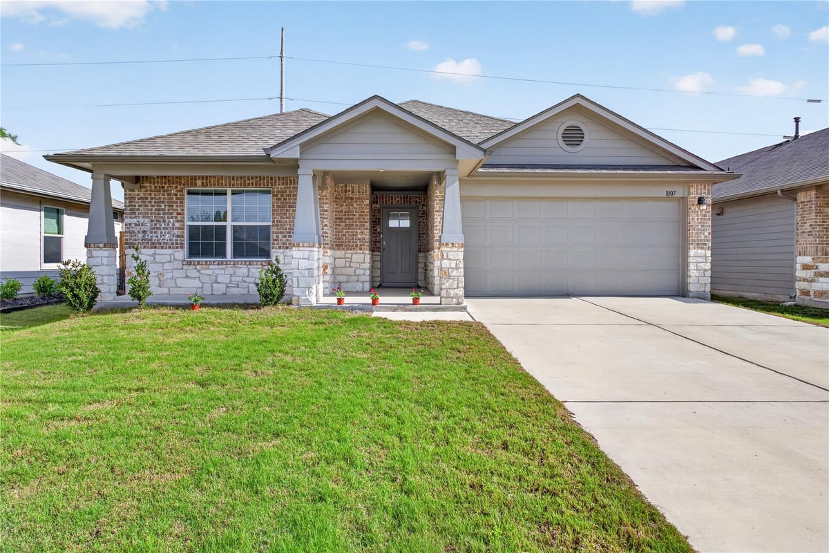 View 1007 Coolridge Ct in MAGER MEADOWS 1007 Coolridge Ct - front exterior - Luxury home in MAGER MEADOWS, Hutto, TX