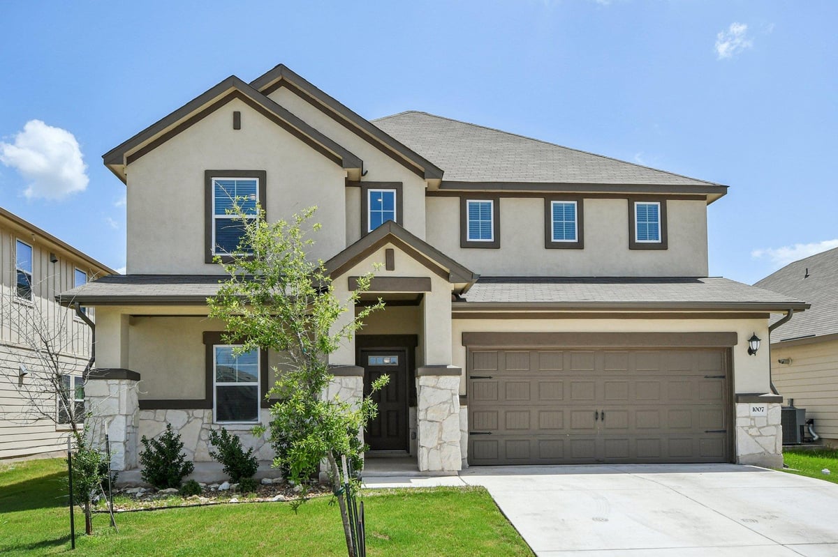 View 1007 Guadalupe Bass RD in Cross Creek 1007 Guadalupe Bass RD - front exterior - Luxury home in Cross Creek, Hutto, TX