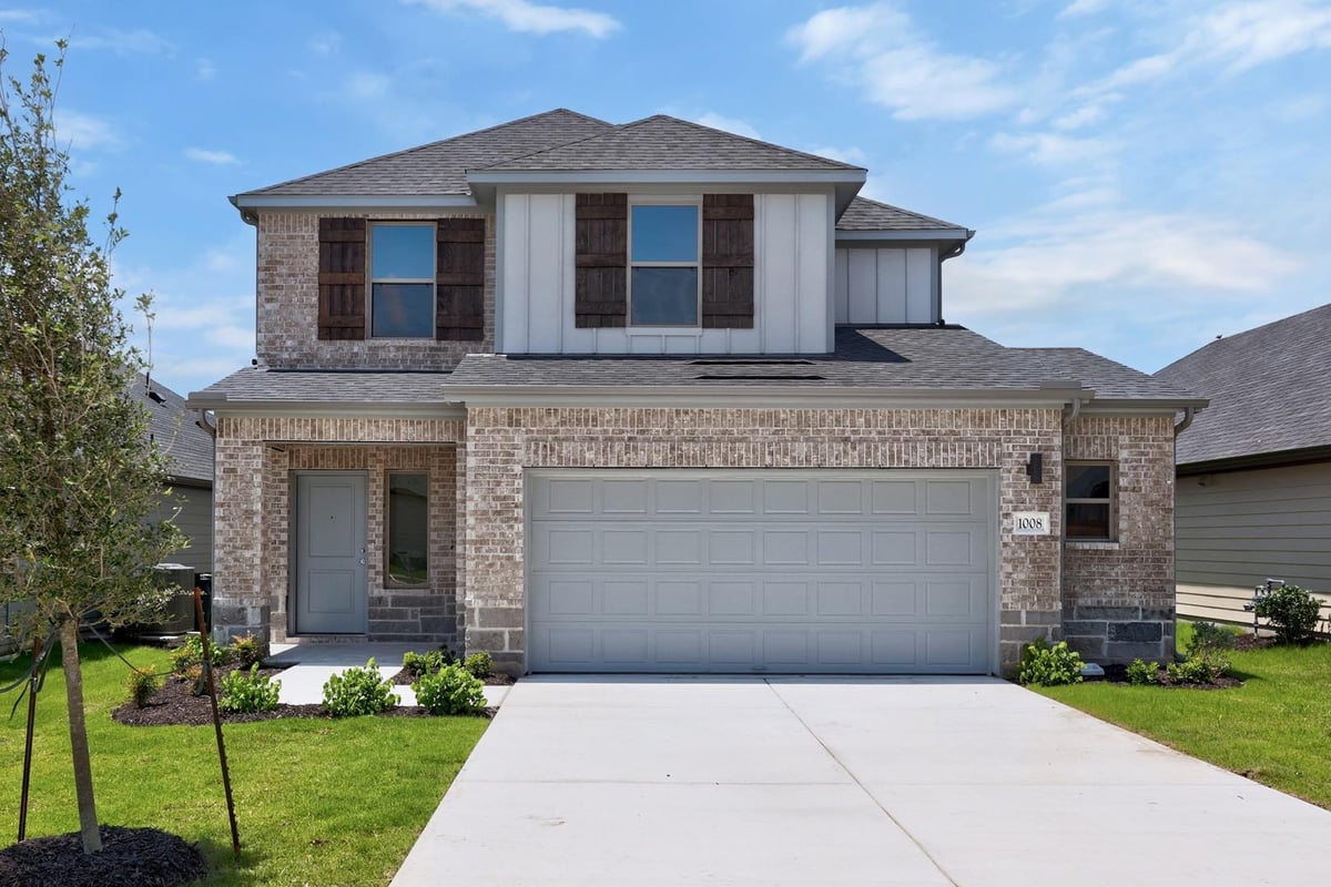 View 1008 Universal Dr in Prairie Winds 1008 Universal Dr - front exterior - Luxury home in Prairie Winds, Hutto, TX