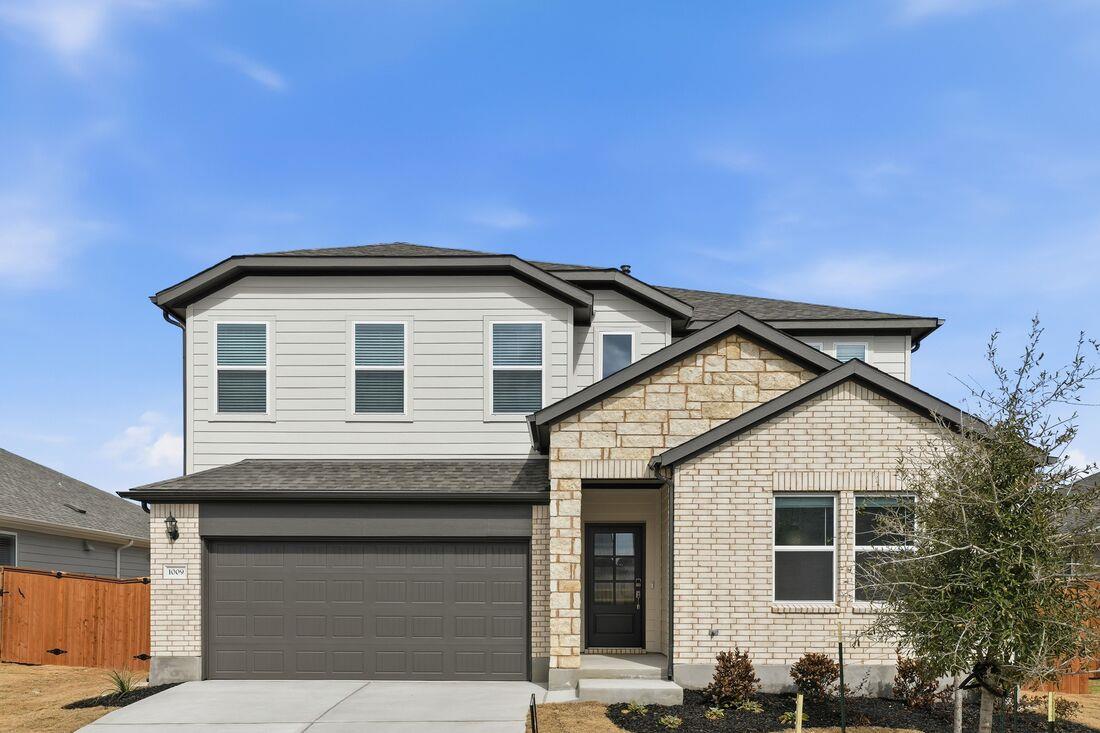 View 1009 Vanderscile RD in Emory Crossing 1009 Vanderscile RD - front exterior - Luxury home in Emory Crossing, Hutto, TX