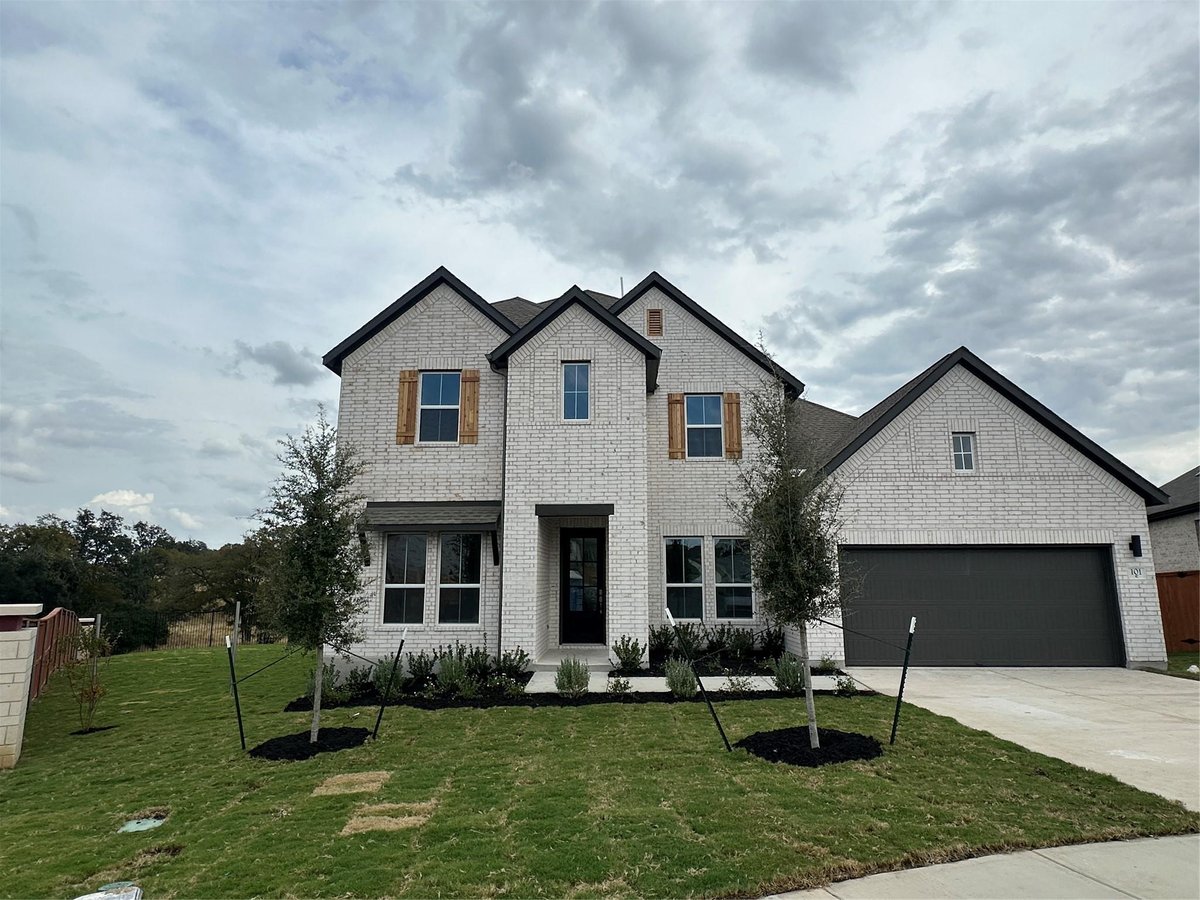 View 101 Smoke Signal Ct in Lariat 101 Smoke Signal Ct - front exterior - Luxury home in Lariat, Liberty Hill, TX