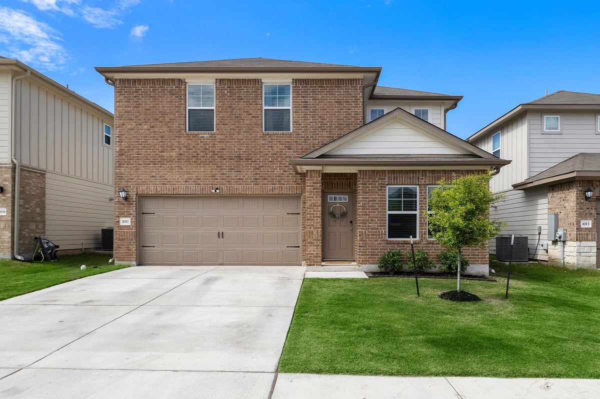 View 1011 Round Bale RD in Cross Creek 1011 Round Bale RD - front exterior - Luxury home in Cross Creek, Hutto, TX
