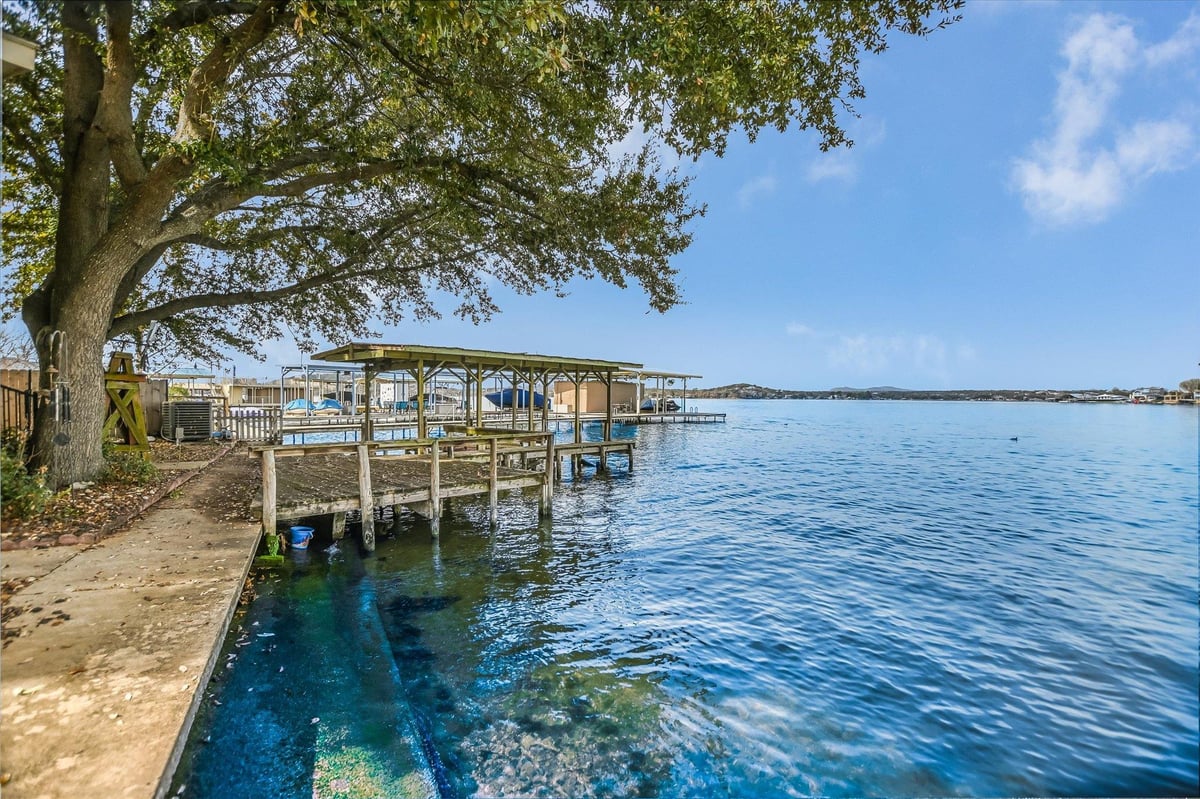 View 1018 Impala Dr in IMPALA ISLE 1018 Impala Dr - front exterior - Luxury home in IMPALA ISLE, Granite Shoals, TX