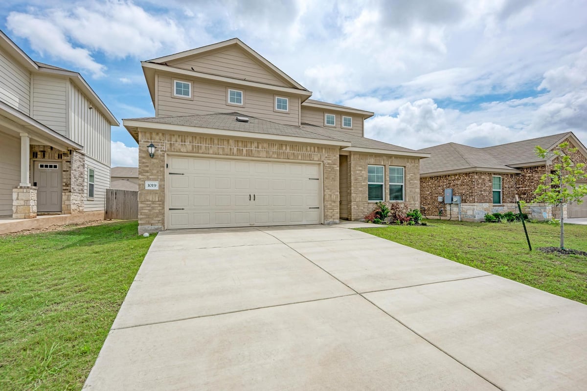 View 1019 Round Bale RD in Cross Crk Sub Phs 3 & 4 1019 Round Bale RD - front exterior - Luxury home in Cross Crk Sub Phs 3 & 4, Hutto, TX
