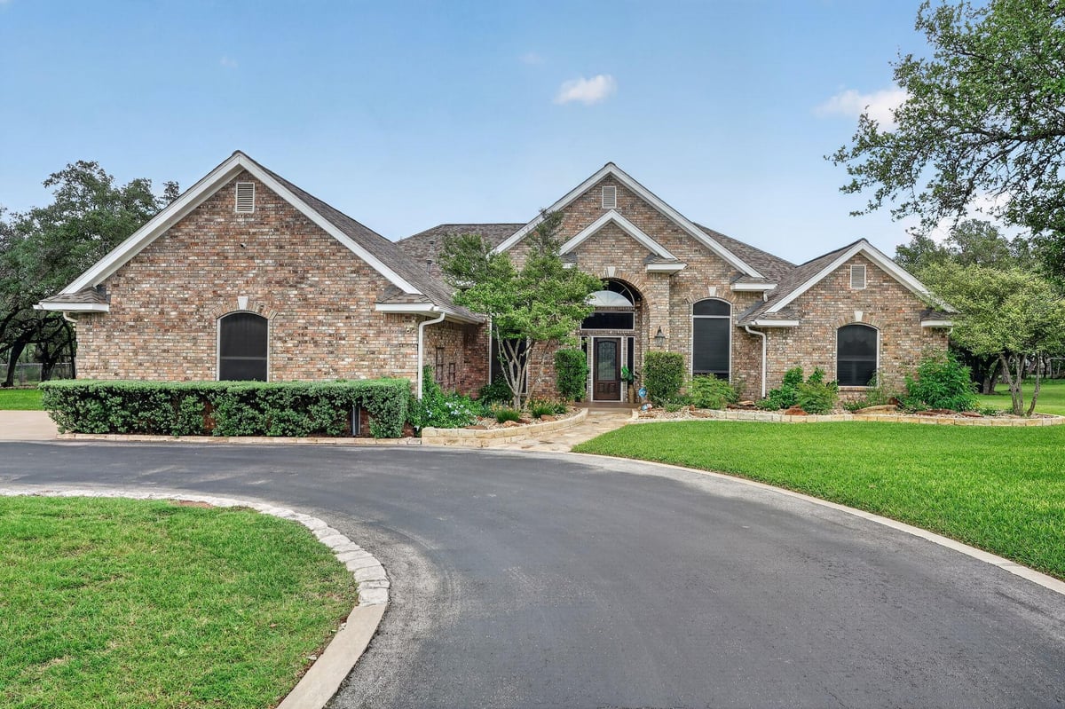 View 104 Lakewood TRL in Country Estates Ph 1 104 Lakewood TRL - front exterior - Luxury home in Country Estates Ph 1, Leander, TX