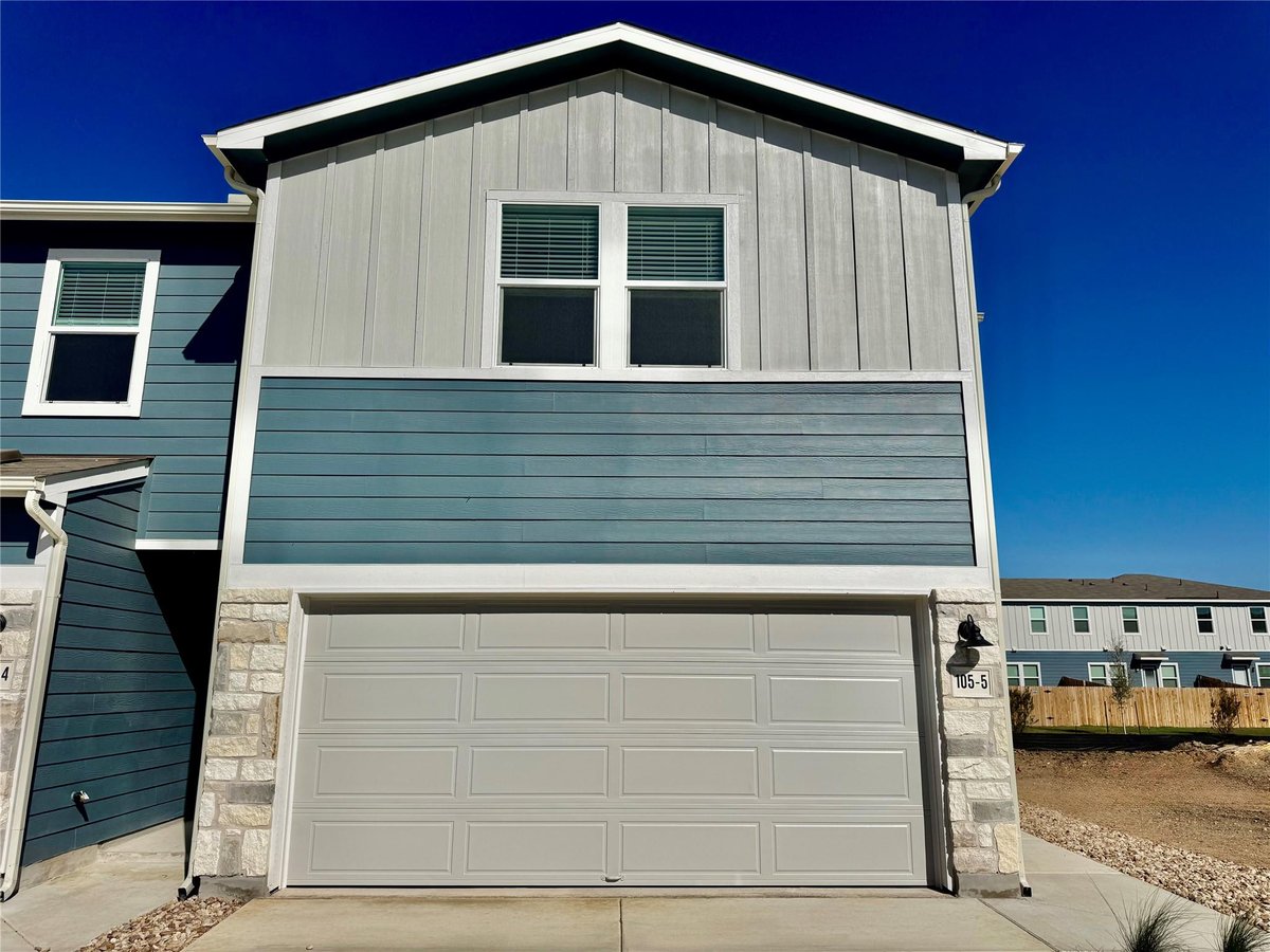 View 105 Calcite Rd Unit #5 in Waterstone 105 Calcite Rd Unit #5 - front exterior - Luxury home in Waterstone, Kyle, TX