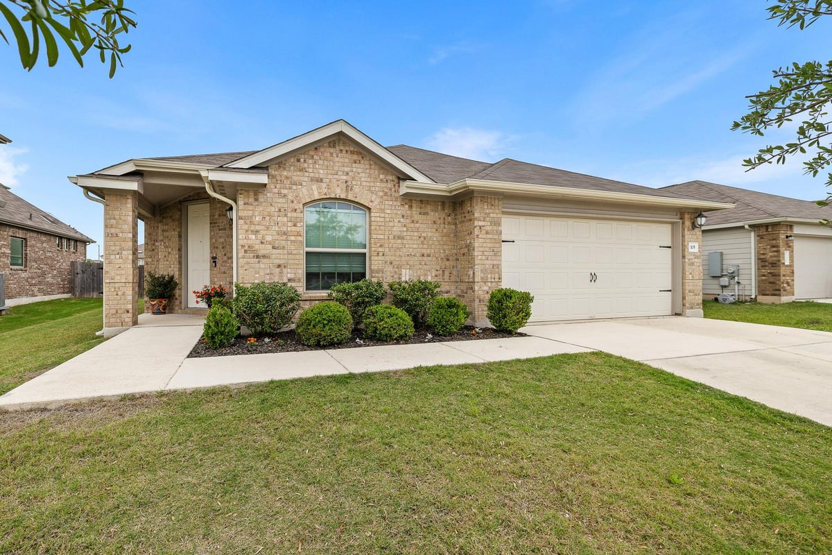 View 105 Sophora DR in Hutto Highlands 105 Sophora DR - front exterior - Luxury home in Hutto Highlands, Hutto, TX