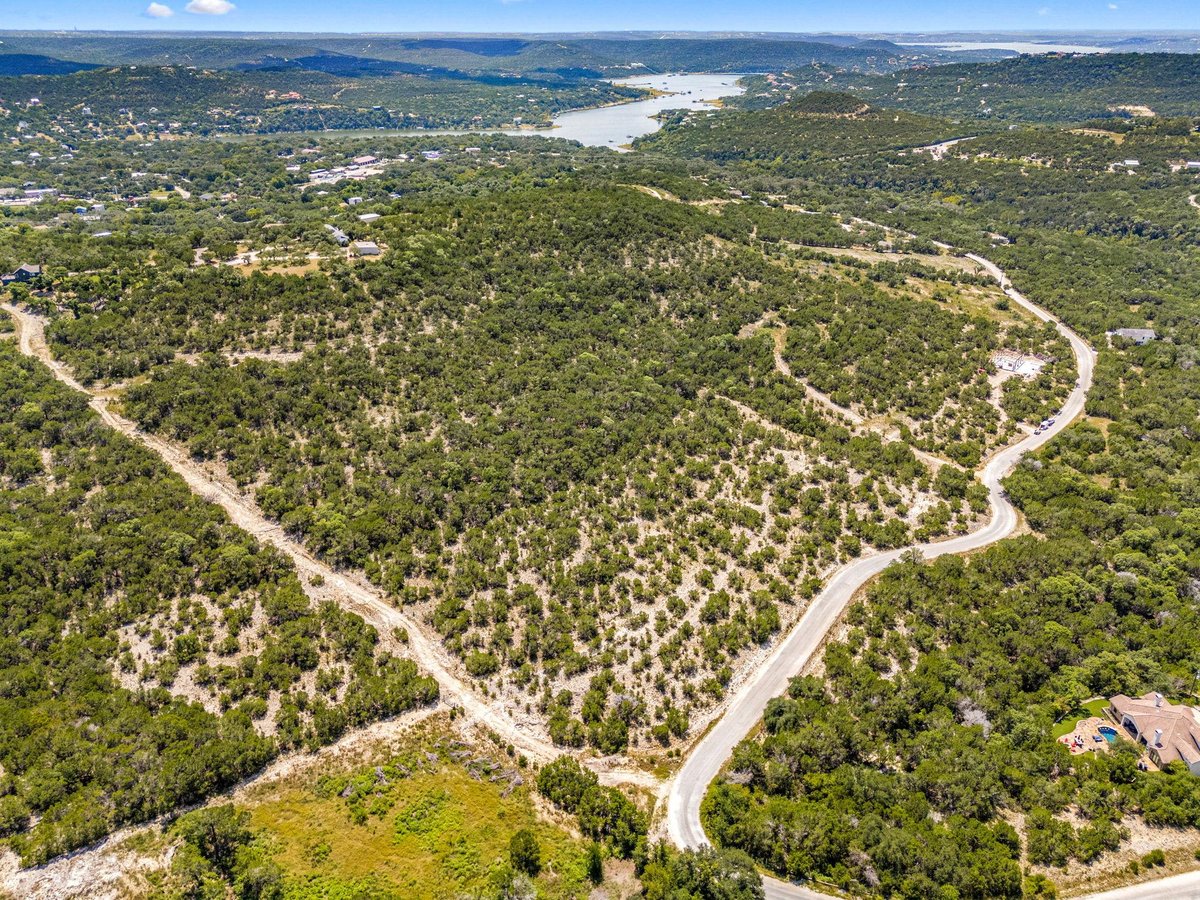 View 10686 Deer Canyon Rd in PANORAMIC HILLS 10686 Deer Canyon Rd - front exterior - Luxury lot in PANORAMIC HILLS, Jonestown, TX