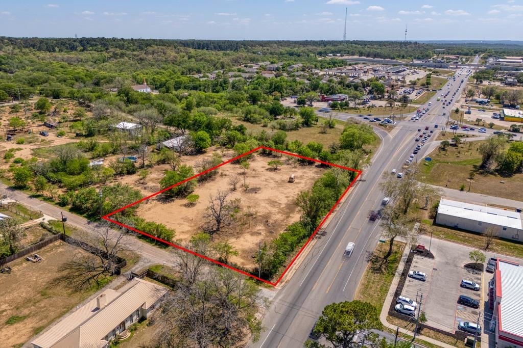 View 1105 State Highway 95 Hwy in Building Blk 1105 State Highway 95 Hwy - front exterior - Luxury lot in Building Blk, Bastrop, TX
