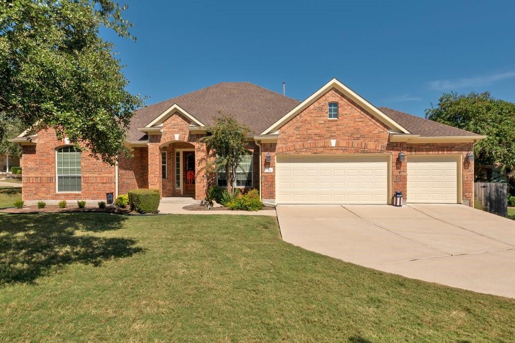View 111 Aberdeen Ct in Belterra Ph II Sec 9a 111 Aberdeen Ct - front exterior - Luxury home in Belterra Ph II Sec 9a, Austin, TX