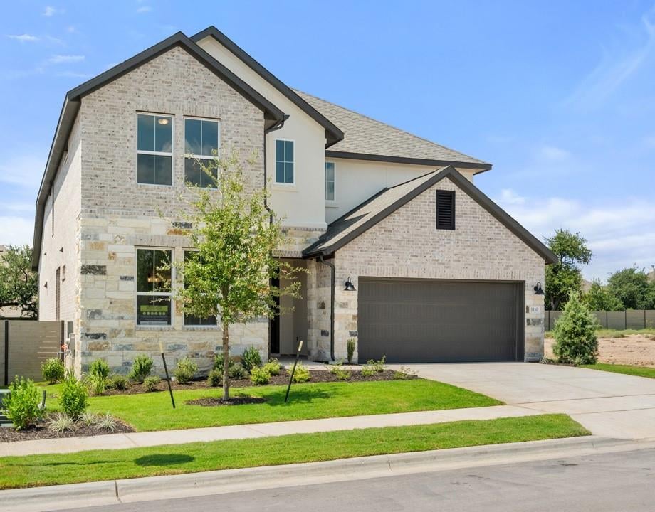 View 1110 Blue Moon Drive in Wolf Ranch 1110 Blue Moon Drive - front exterior - Luxury home in Wolf Ranch, Georgetown, TX