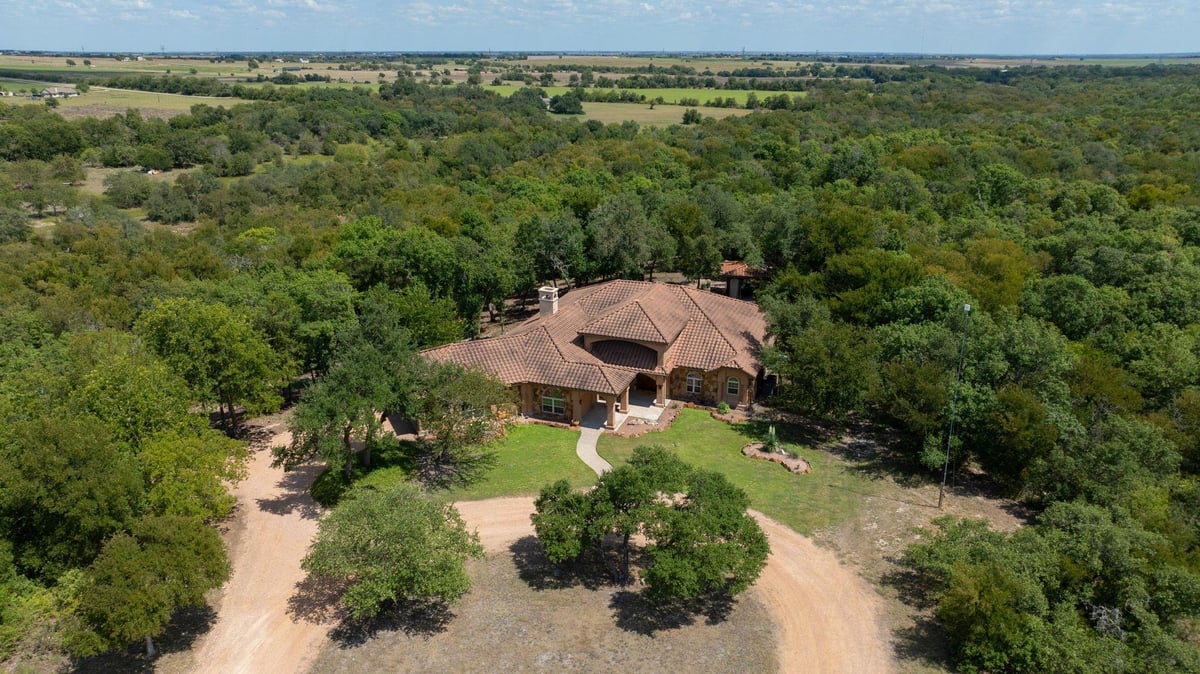 View 1120 Redbird Rd 1120 Redbird Rd - front exterior - Luxury home in Georgetown, TX