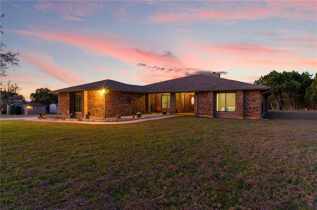 View 11208 Southwest Oaks in Oak Run Estates 11208 Southwest Oaks - front exterior - Luxury home in Oak Run Estates, Austin, TX