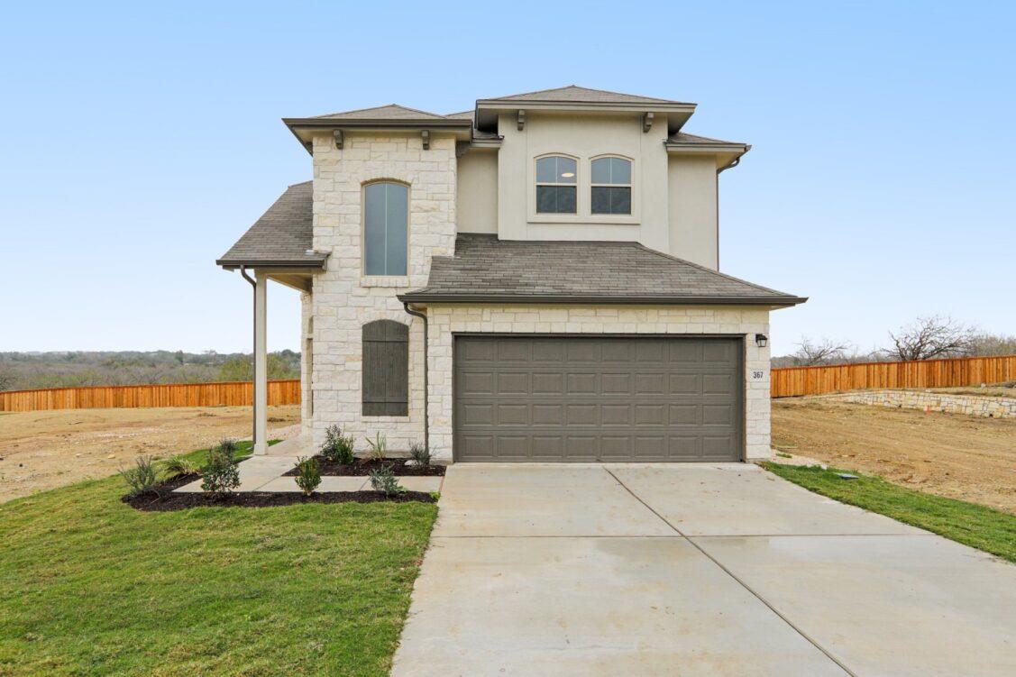 View 11208 Zip Cochise WAY in Saddle Ridge at Wildhorse Ranch 11208 Zip Cochise WAY - front exterior - Luxury home in Saddle Ridge at Wildhorse Ranch, Manor, TX
