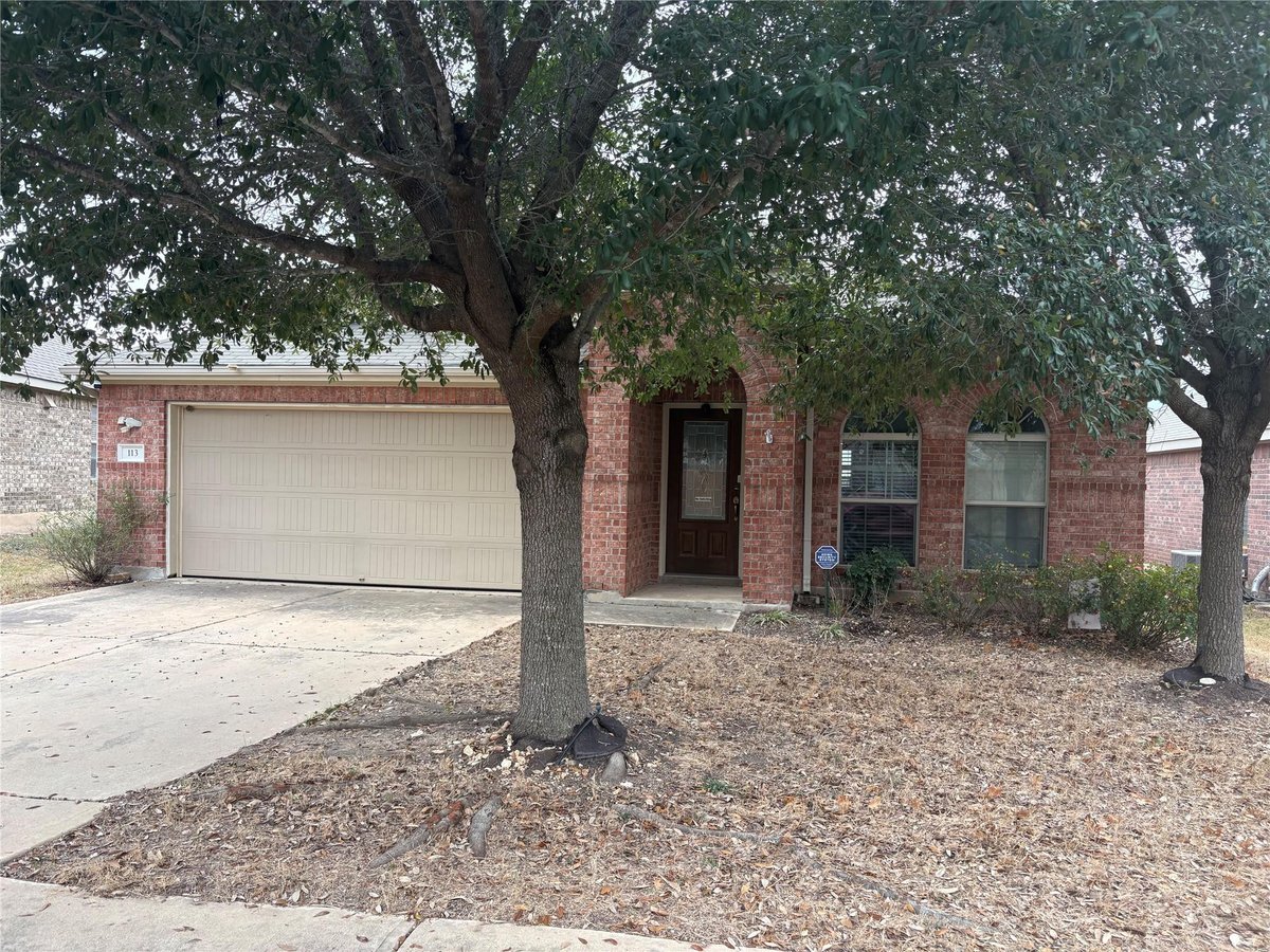 View 113 Granite Path in Stonewall Ranch Sec 02 113 Granite Path - front exterior - Luxury home in Stonewall Ranch Sec 02, Liberty Hill, TX