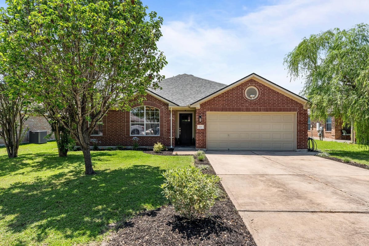 View 113 Hanstrom DR in Legends Hutto Ph 03 113 Hanstrom DR - front exterior - Luxury home in Legends Hutto Ph 03, Hutto, TX