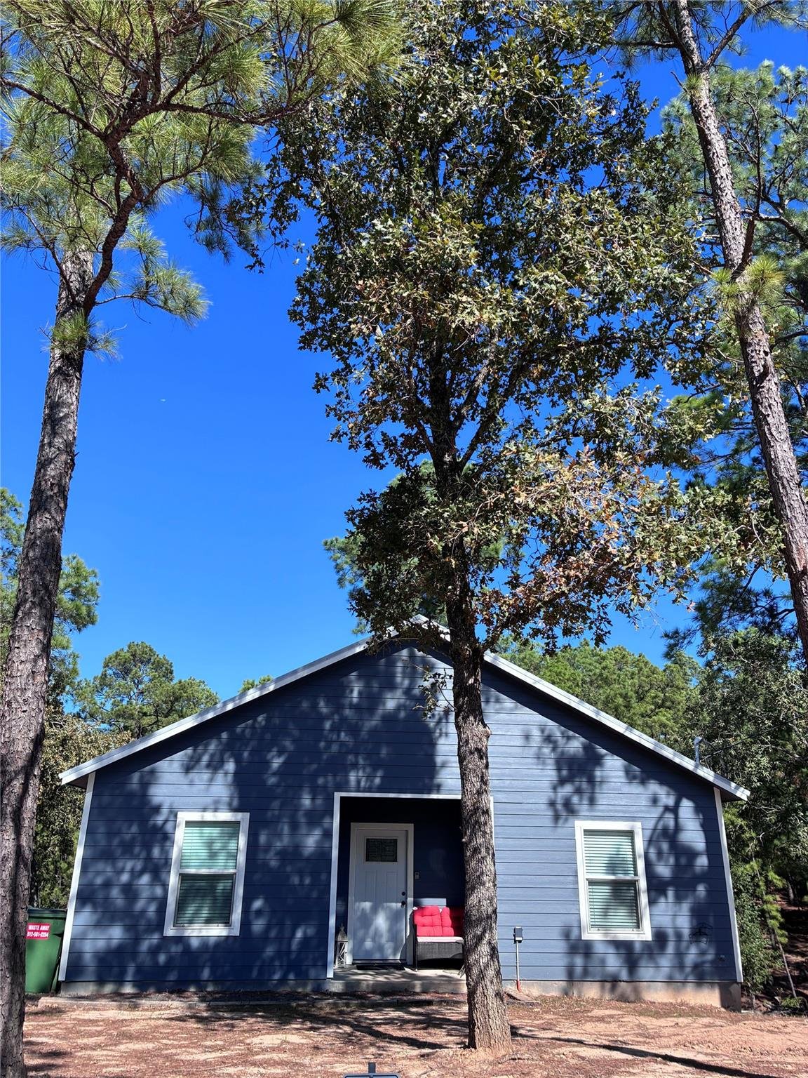 View 1135 Red Fox Rd in Clear Lake Pines - Sec 4 1135 Red Fox Rd - front exterior - Luxury home in Clear Lake Pines - Sec 4, La Grange, TX