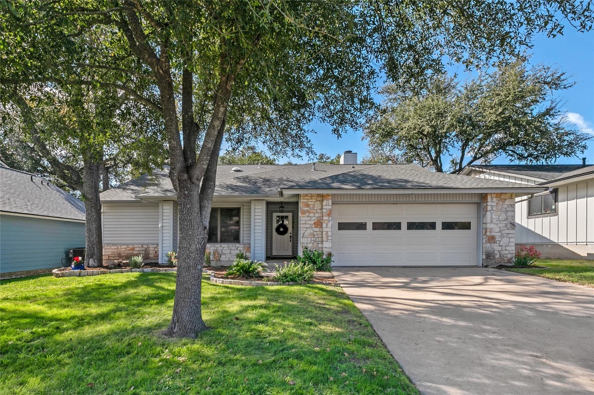 View 11518 Powder Mill Trl in Anderson Mill 11518 Powder Mill Trl - front exterior - Luxury home in Anderson Mill, Austin, TX