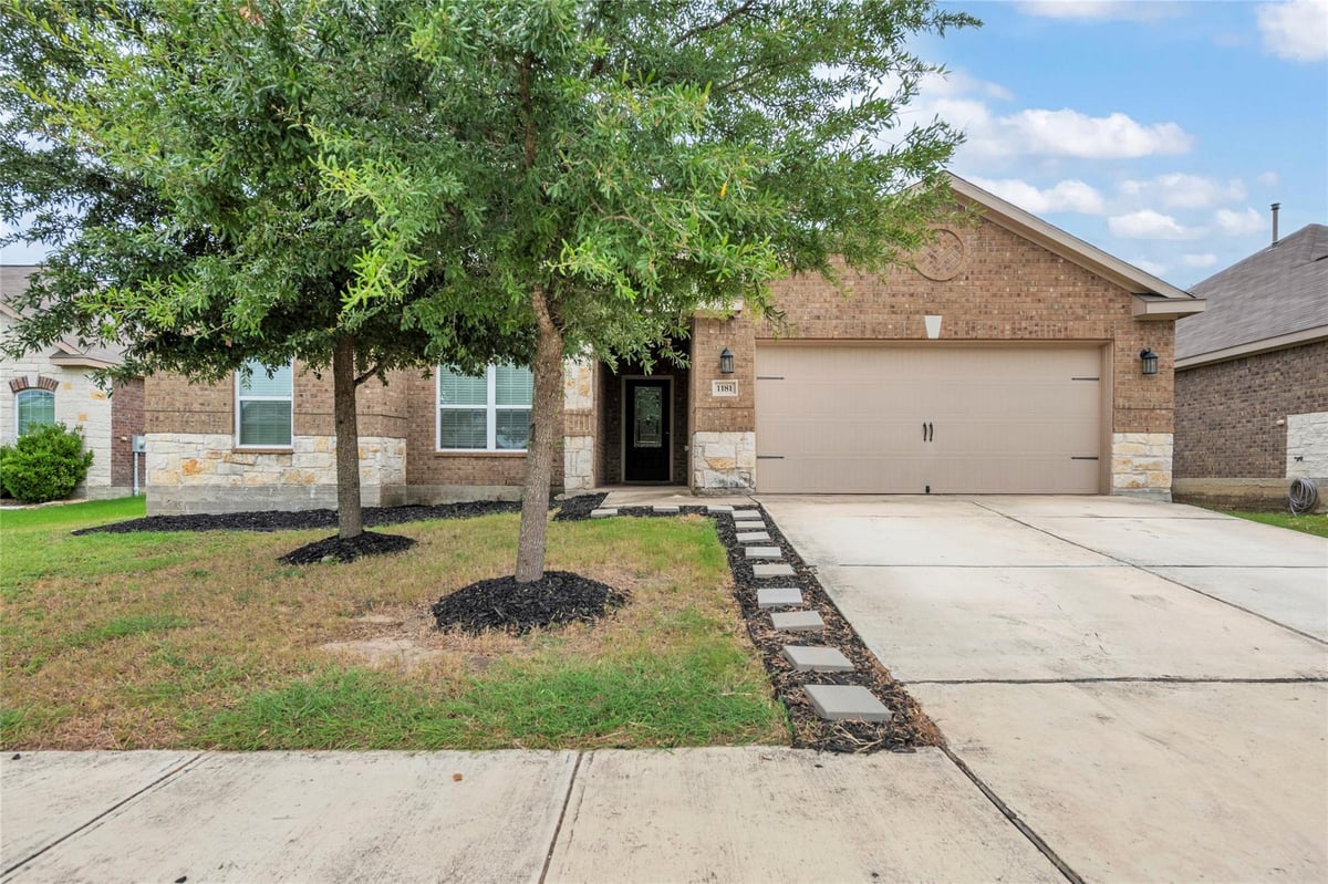 View 1181 Violet Ln in Bunton Creek Ph 6B 1181 Violet Ln - front exterior - Luxury home in Bunton Creek Ph 6B, Kyle, TX