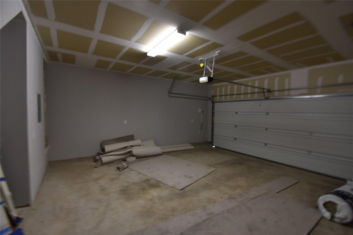12008 Corsicana Trl Unit #22 - front exterior - Luxury home in ENCLAVE AT LAGOS, Manor, TX