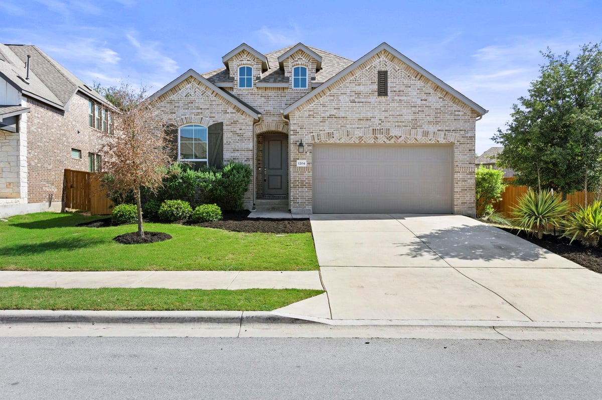 View 1204 Texas Ash LN in Parkside/River Ph 1A 1204 Texas Ash LN - front exterior - Luxury home in Parkside/River Ph 1A, Georgetown, TX