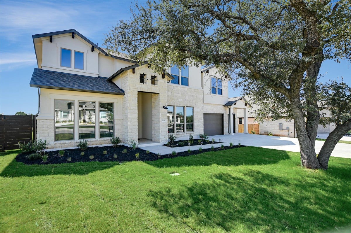 View 1209 Stormy Dr in Riverstone 1209 Stormy Dr - front exterior - Luxury home in Riverstone, Georgetown, TX