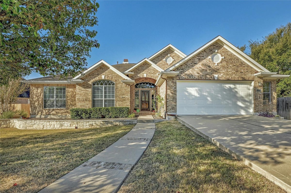 View 121 Bolton Dr in Belterra Ph 1 Sec 8 121 Bolton Dr - front exterior - Luxury home in Belterra Ph 1 Sec 8, Austin, TX