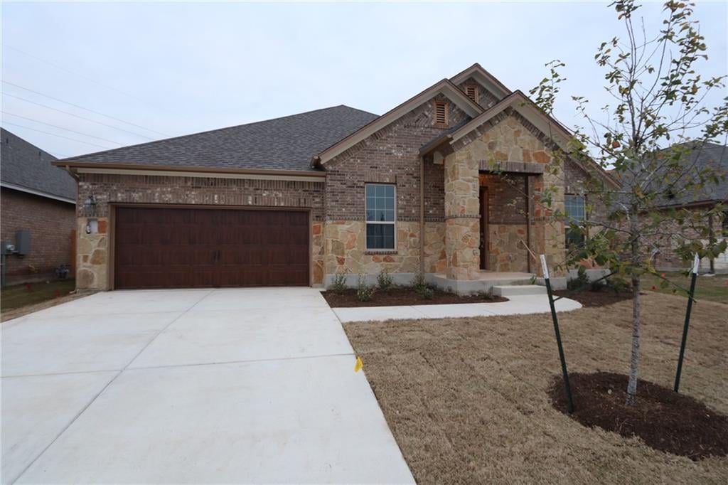 View 1210 Knowles DR 1210 Knowles DR - front exterior - Luxury home in Hutto, TX