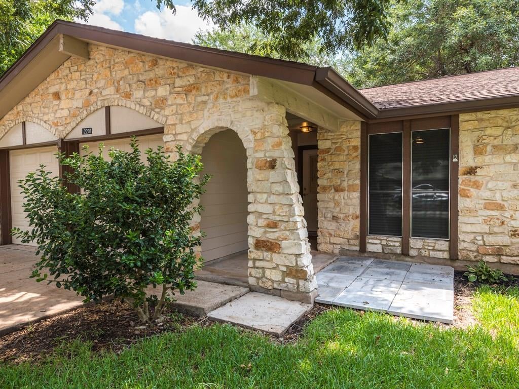 12201 Old Stage Trl - front exterior - Luxury home in Village 01 At Anderson Mill, Austin, TX