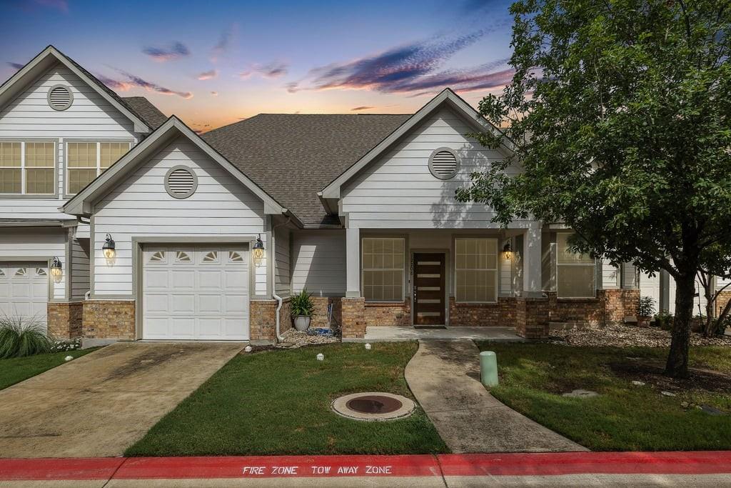 View 12208 Abbey Glen Ln Unit #D in Victoria Glen 12208 Abbey Glen Ln Unit #D - front exterior - Luxury home in Victoria Glen, Austin, TX