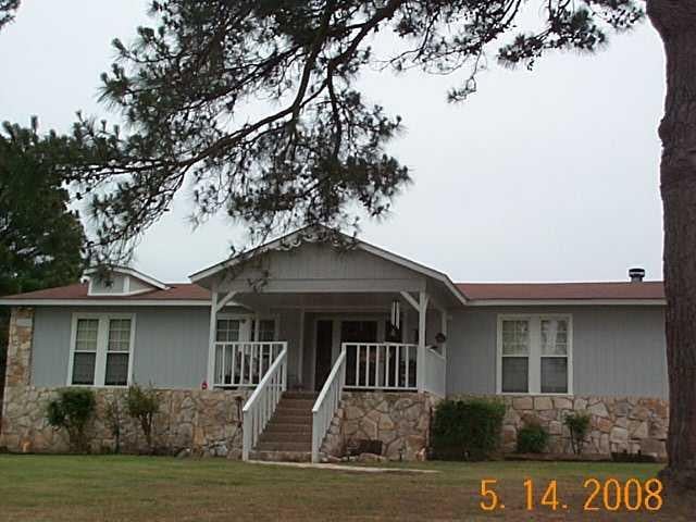 View 123 Kinsey RD 123 Kinsey RD - front exterior - Luxury home in Paige, TX