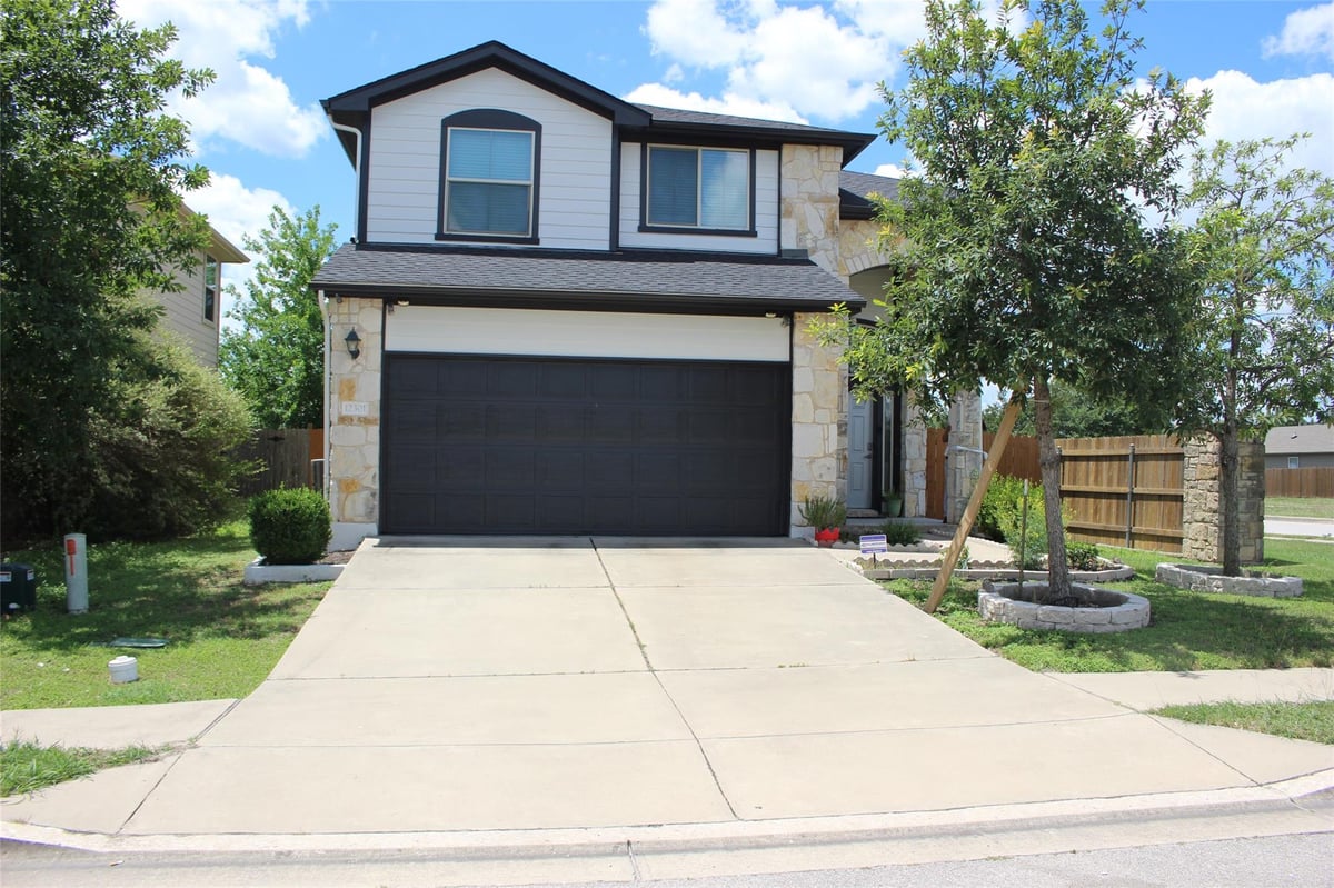 View 12301 Stoneridge Gap Ln in Stonewater 12301 Stoneridge Gap Ln - front exterior - Luxury home in Stonewater, Manor, TX