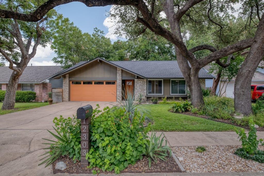 View 12303 Old Stage Trl in Village 01 Anderson Mill 12303 Old Stage Trl - front exterior - Luxury home in Village 01 Anderson Mill, Austin, TX