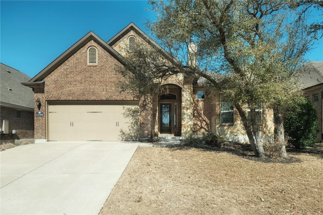 View 1239 Falling Hills DR in Water Oak 1239 Falling Hills DR - front exterior - Luxury home in Water Oak, Georgetown, TX