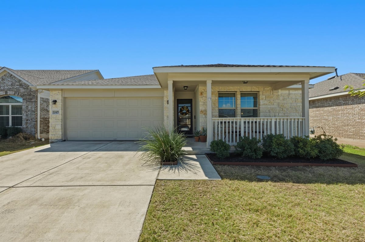 View 12425 Ostrich TRL in Village at Manor Commons 12425 Ostrich TRL - front exterior - Luxury home in Village at Manor Commons, Manor, TX