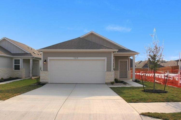 View 127 Two Bits LN in Trinity Ranch 127 Two Bits LN - front exterior - Luxury home in Trinity Ranch, Elgin, TX