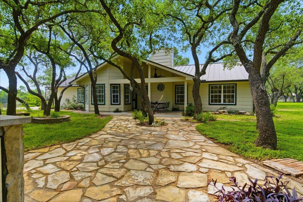 View 12702 Trails End Rd in North Rim Sec 02 12702 Trails End Rd - front exterior - Luxury home in North Rim Sec 02, Cedar Park, TX
