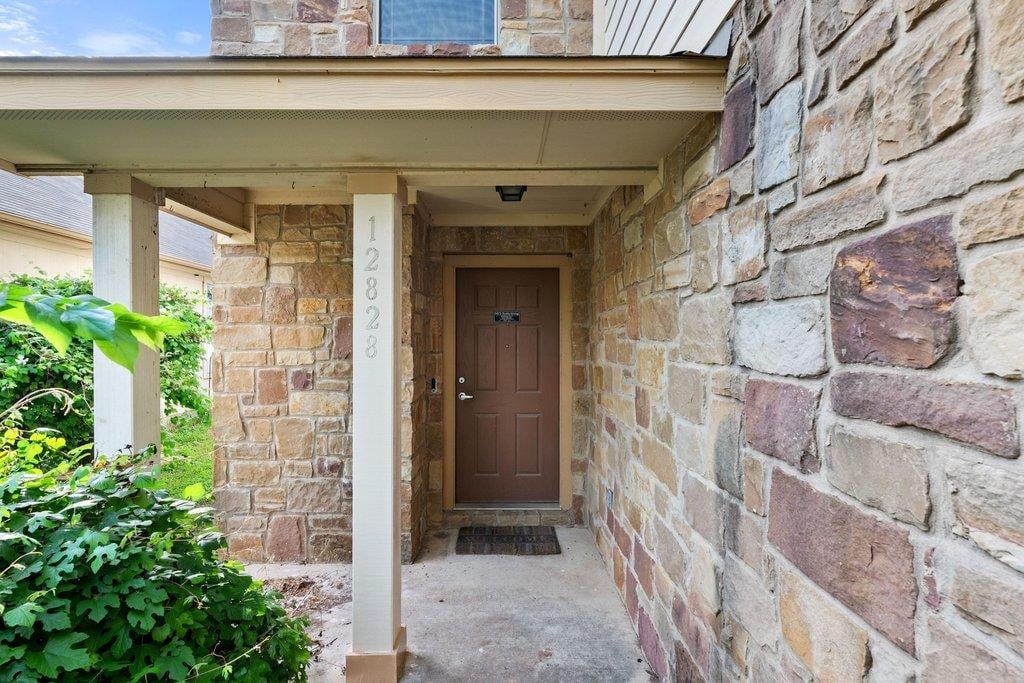 View 12828 Snow Ln in Bell Farms Ph 2A Amd 12828 Snow Ln - front exterior - Luxury home in Bell Farms Ph 2A Amd, Manor, TX