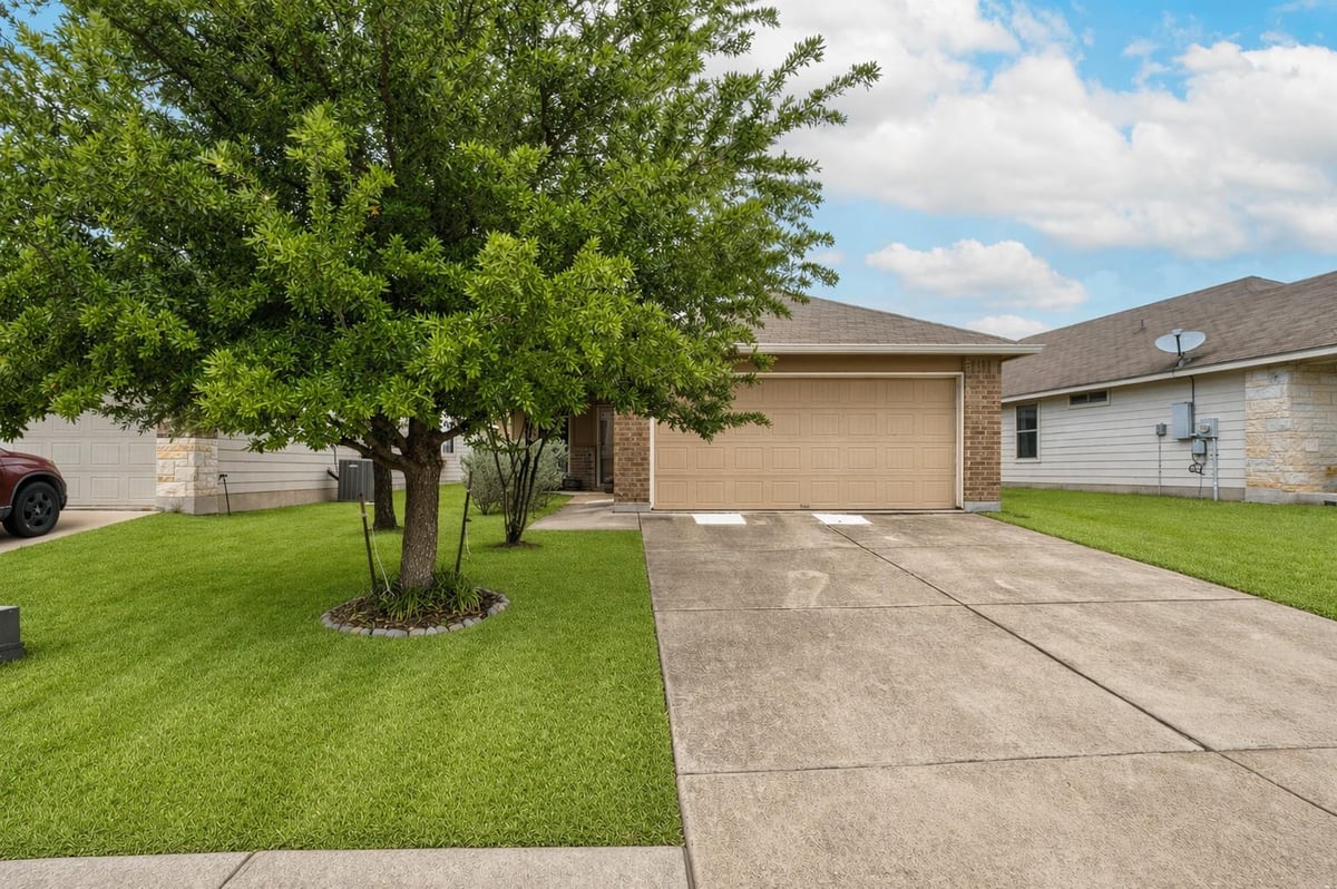 View 12916 Snow LN in Bell Farms Ph 2A Amd 12916 Snow LN - front exterior - Luxury home in Bell Farms Ph 2A Amd, Manor, TX