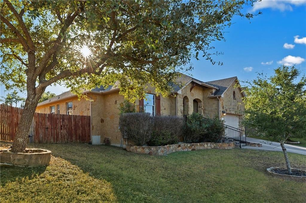 View 131 Canterbury Dr in Belterra Ph II Sec 2 131 Canterbury Dr - front exterior - Luxury home in Belterra Ph II Sec 2, Austin, TX