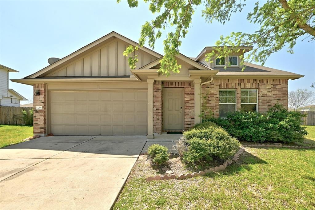 View 13205 Pine Needle St in Carriage Hills Sec 03 13205 Pine Needle St - front exterior - Luxury home in Carriage Hills Sec 03, Manor, TX