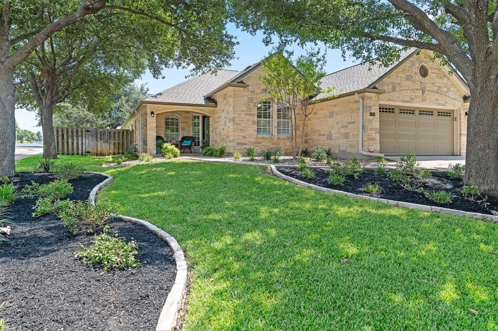 View 13305 Armaga Springs Rd in Scofield Farms Ph 08 Sec 01 13305 Armaga Springs Rd - front exterior - Luxury home in Scofield Farms Ph 08 Sec 01, Austin, TX