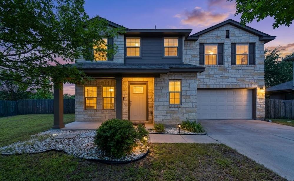 View 13309 Prairie Sage CV in Carriage Hills Sec 01 13309 Prairie Sage CV - front exterior - Luxury home in Carriage Hills Sec 01, Manor, TX