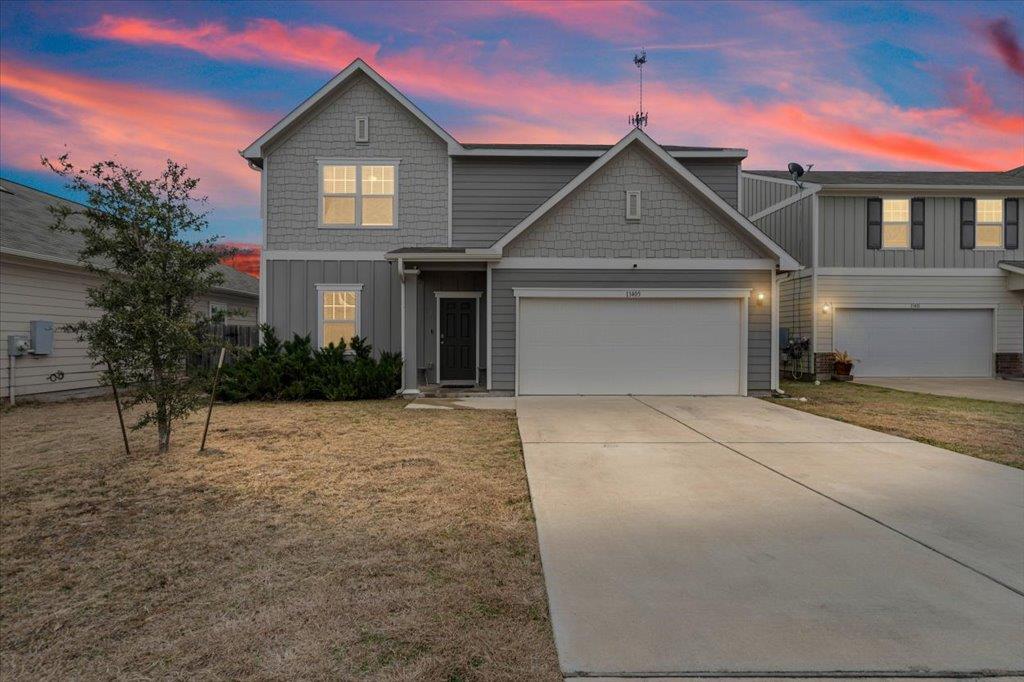 View 13405 Charles Abraham Way in Presidential Heights 13405 Charles Abraham Way - front exterior - Luxury home in Presidential Heights, Manor, TX