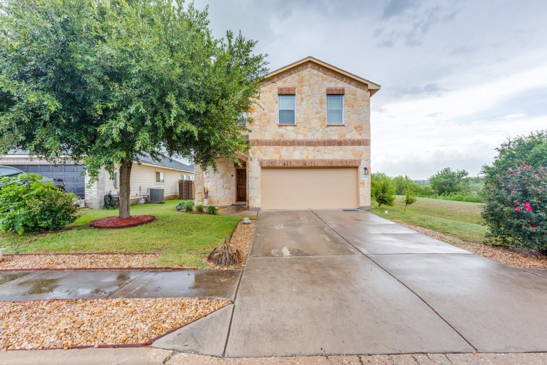 View 13408 Ring Dr in Carriage Hills Sec 01 13408 Ring Dr - front exterior - Luxury home in Carriage Hills Sec 01, Manor, TX
