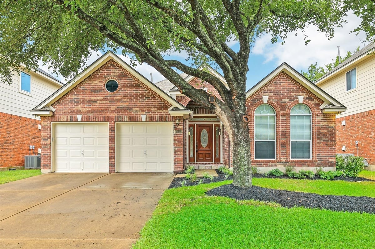 View 13500 Campesina Dr in Scofield Farms Ph 08 Sec 07 13500 Campesina Dr - front exterior - Luxury home in Scofield Farms Ph 08 Sec 07, Austin, TX