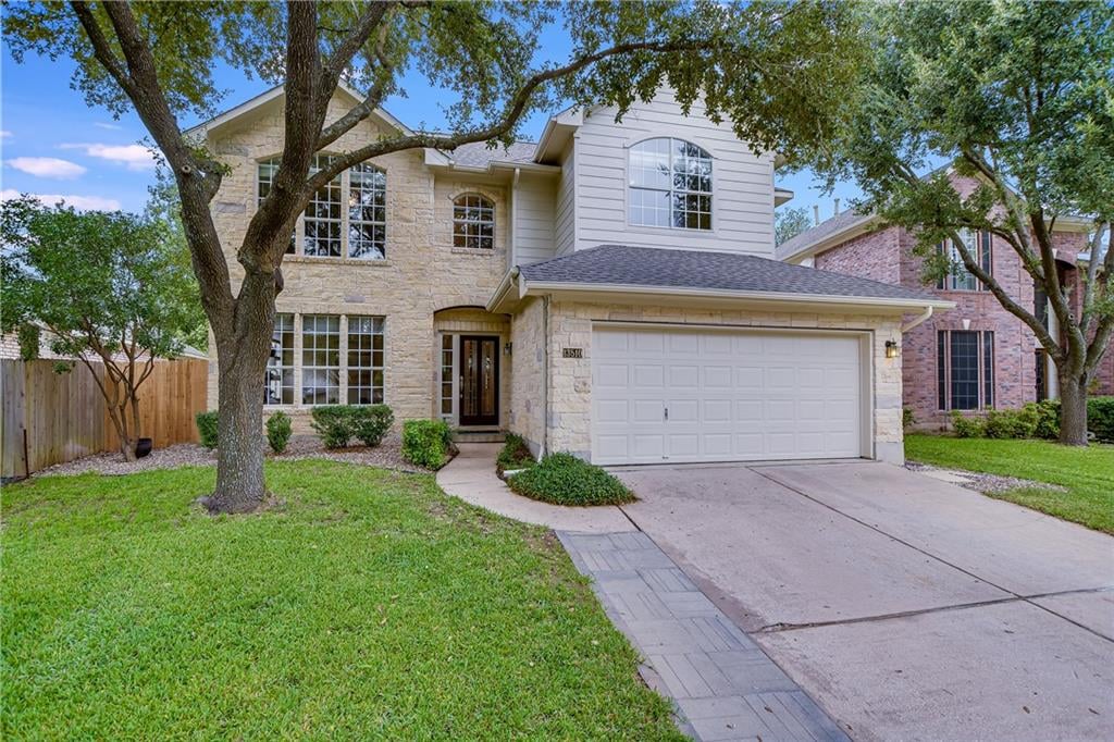 View 13510 Lamplight Village Ave in Scofield Farms Ph 08 Sec 03 13510 Lamplight Village Ave - front exterior - Luxury home in Scofield Farms Ph 08 Sec 03, Austin, TX