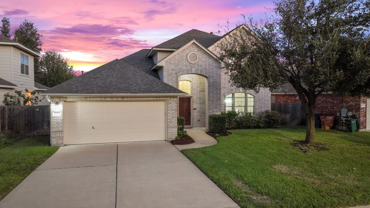 View 13513 Shawna Dnay Dr in Woods Of Century Park Sec 2 13513 Shawna Dnay Dr - front exterior - Luxury home in Woods Of Century Park Sec 2, Austin, TX