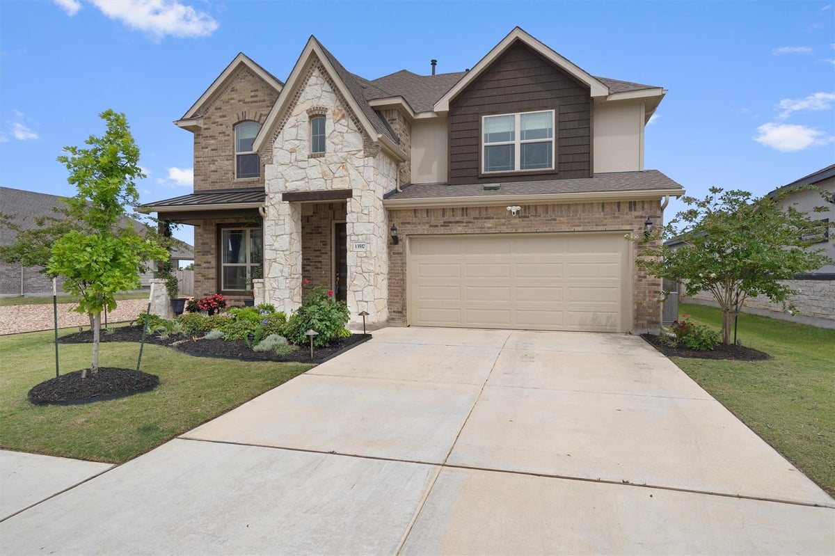 View 13517 William Tyler WAY in Carillon 13517 William Tyler WAY - front exterior - Luxury home in Carillon, Manor, TX
